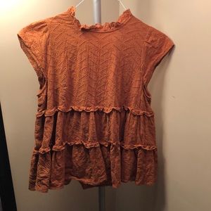 Burnt orange peplum top